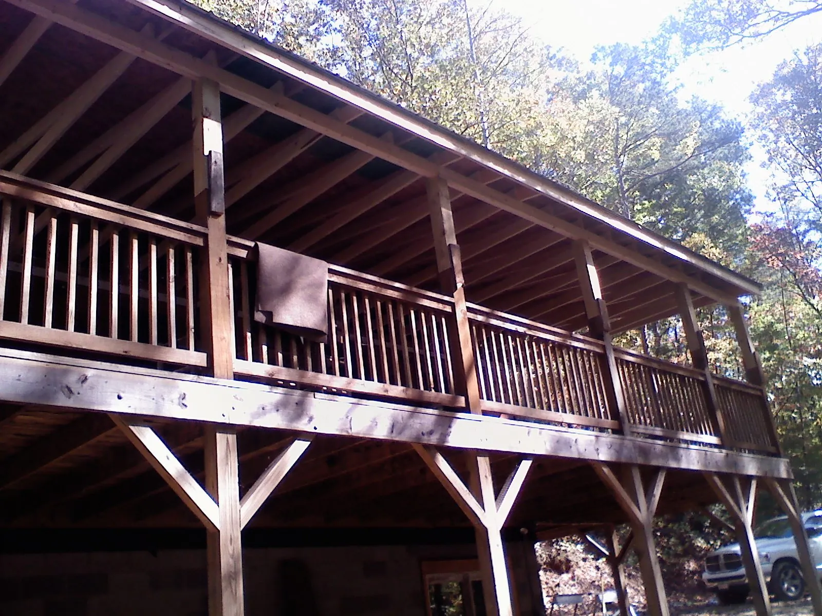 Timber framing under a new elevated porch and deck — Roof Leak Repair in Mcchord Afb by Roofing Brothers